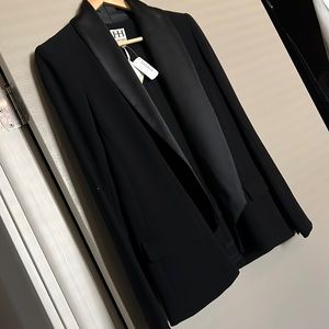 Haute Hippie Tux open lapel jacket with 100% silk lapel and lining.